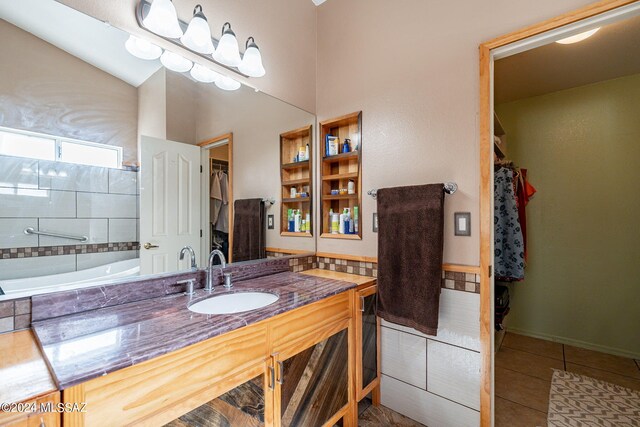 full bathroom featuring toilet, a shower stall, tile walls, and vanity