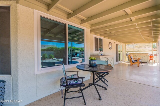 view of patio with a ceiling fan