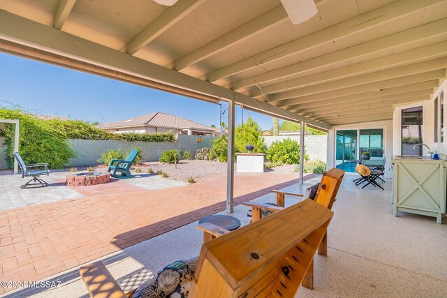 view of patio featuring a ceiling fan