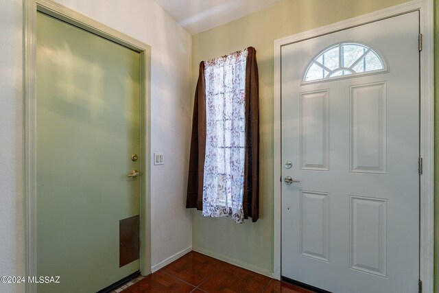 living area with marble finish floor, washer / clothes dryer, visible vents, a ceiling fan, and vaulted ceiling