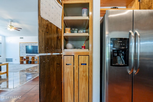 details with stainless steel fridge, visible vents, and ceiling fan