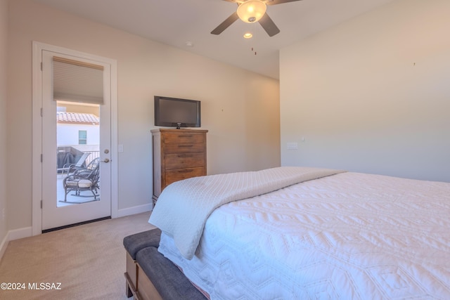 bedroom featuring light colored carpet and ceiling fan