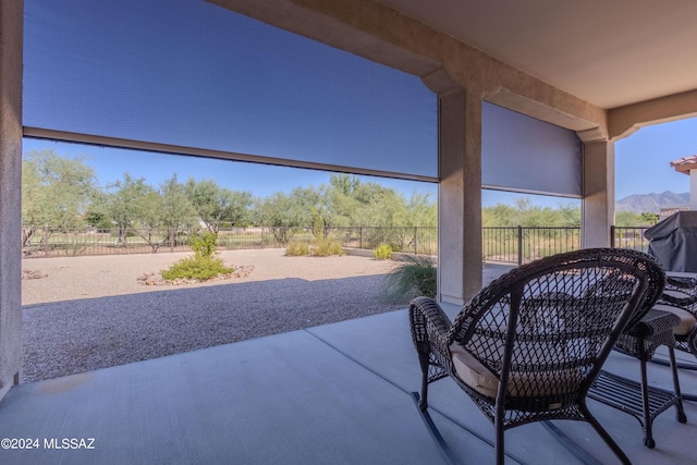 view of patio / terrace with a mountain view