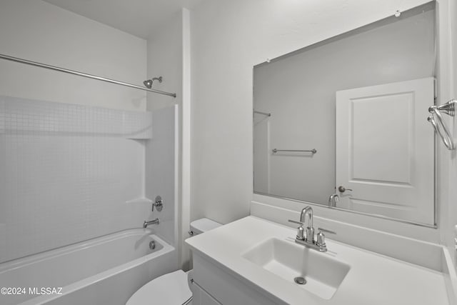 full bathroom featuring bathtub / shower combination, toilet, and vanity