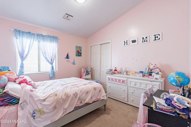 bedroom with light colored carpet, a closet, and lofted ceiling