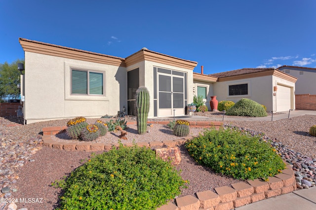 view of front of home with a garage