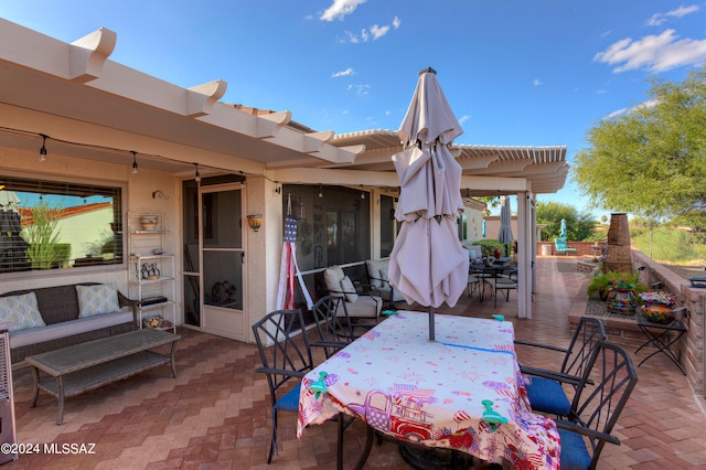 view of patio / terrace featuring a pergola