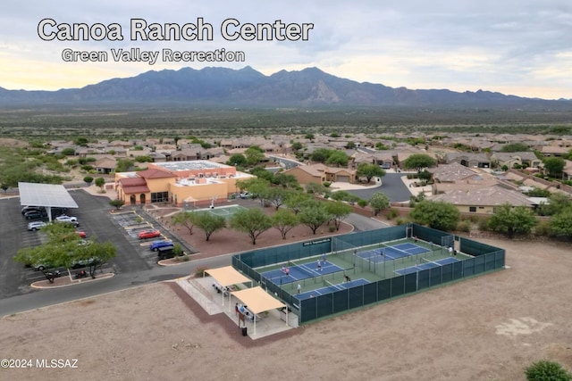 birds eye view of property featuring a mountain view