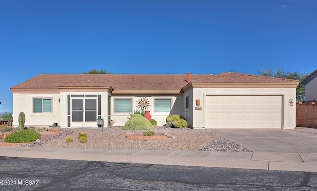 view of front of home with a garage