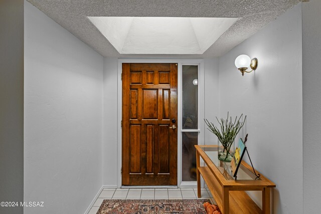 dining room with hardwood / wood-style floors, plenty of natural light, and a brick fireplace