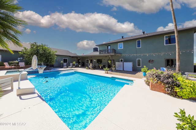 pool with a patio