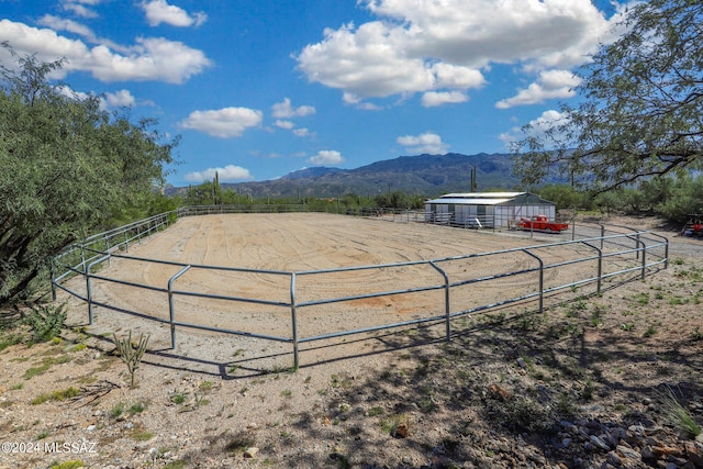 exterior space featuring a rural view and a mountain view