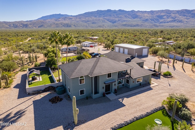 drone / aerial view featuring a mountain view