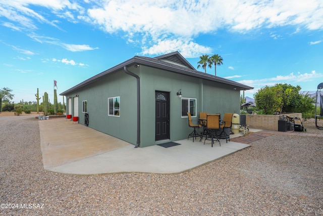 exterior space with a patio area