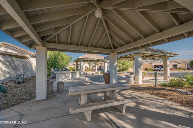 view of patio / terrace with a gazebo and an outdoor kitchen