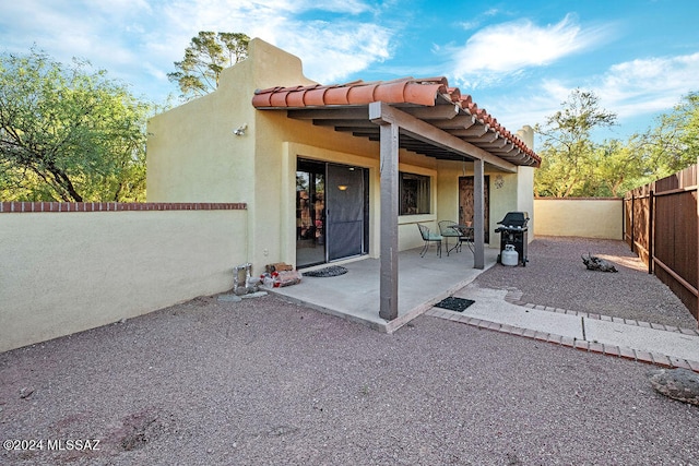 rear view of house with a patio area