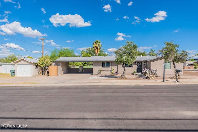 ranch-style home featuring a garage