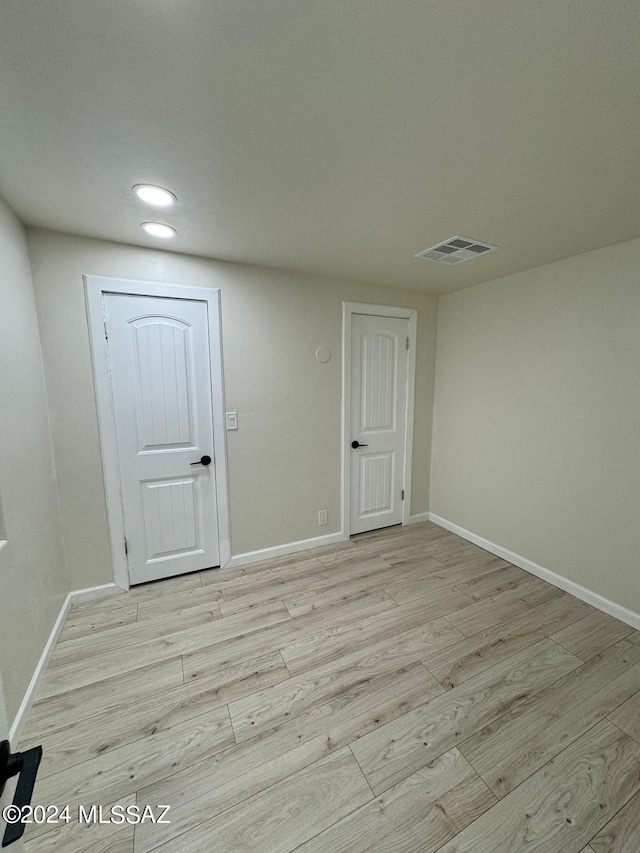 empty room featuring light hardwood / wood-style flooring