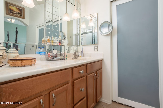 bathroom with vanity and tile patterned floors