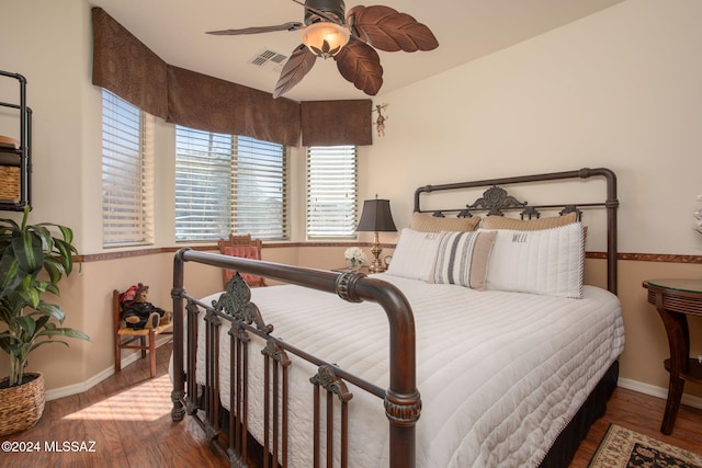 bedroom with wood-type flooring and ceiling fan