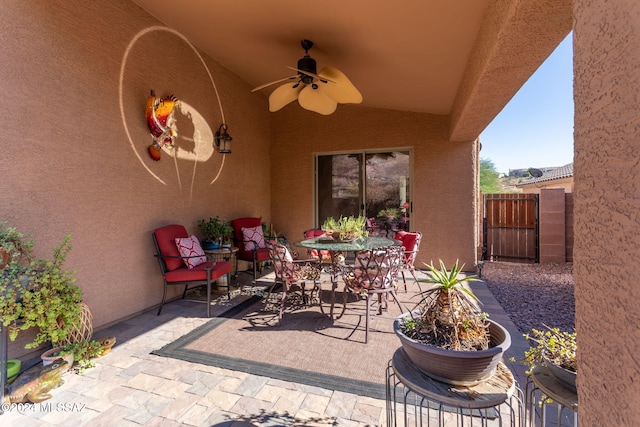 view of patio / terrace featuring ceiling fan