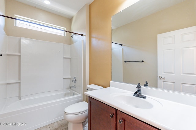 full bathroom featuring tile patterned floors, vanity, toilet, and bathtub / shower combination