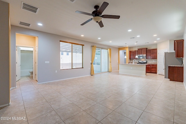 14031 E Troika St, Vail, AZ 85641 - unfurnished living room featuring light tile patterned floors, recessed lighting, and a ceiling fan