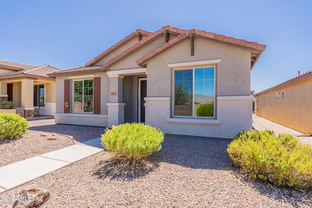 14031 E Troika St, Vail, AZ 85641 - view of front of house featuring stucco siding and a tile roof
