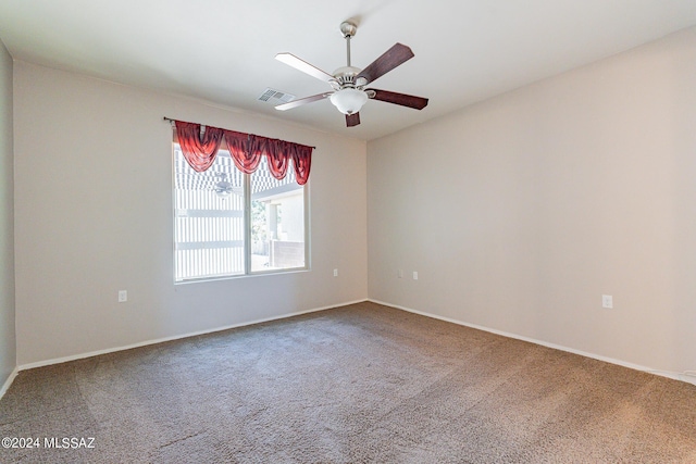 14031 E Troika St, Vail, AZ 85641 - carpeted empty room featuring a ceiling fan and baseboards