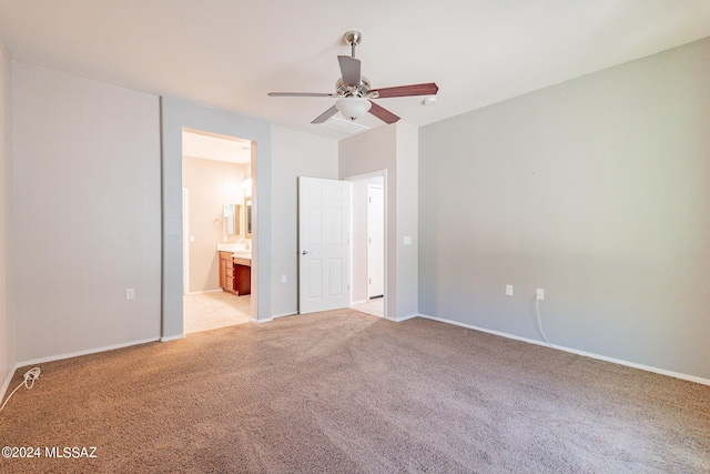 14031 E Troika St, Vail, AZ 85641 - unfurnished bedroom with light colored carpet, ensuite bath, and ceiling fan