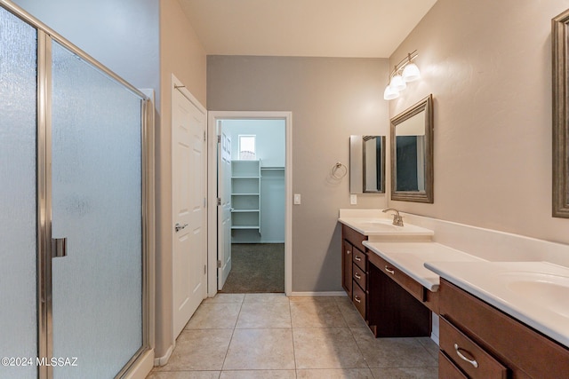 14031 E Troika St, Vail, AZ 85641 - full bath with double vanity, a stall shower, tile patterned floors, and a spacious closet