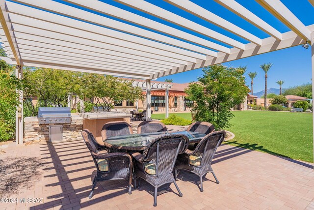 14031 E Troika St, Vail, AZ 85641 - view of patio / terrace with a pergola, area for grilling, and outdoor dining area