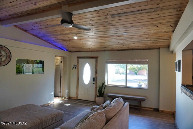 living room featuring ceiling fan, lofted ceiling, dark wood-type flooring, and wood ceiling