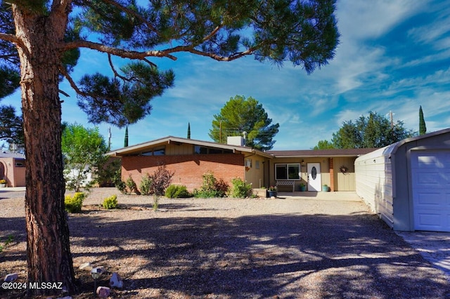 single story home with a garage