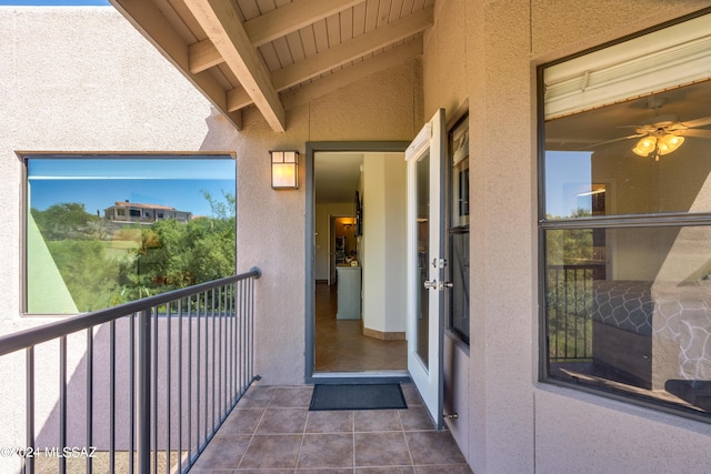 entrance to property featuring a balcony