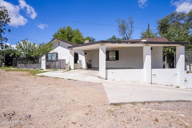 view of front of house with a carport