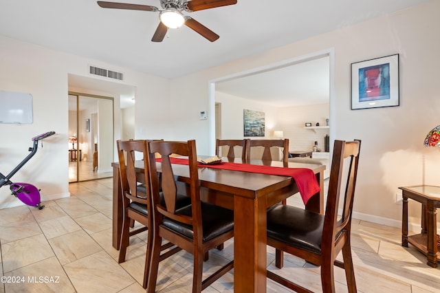 dining area with ceiling fan