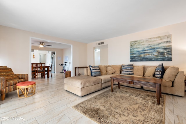 living room featuring ceiling fan