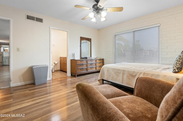 bedroom with ceiling fan and hardwood / wood-style floors