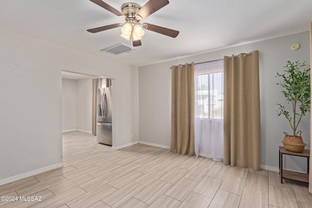 empty room with ceiling fan