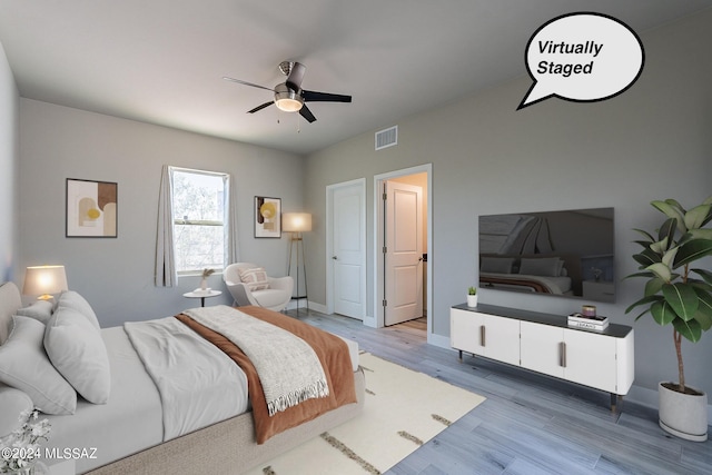 bedroom featuring ceiling fan and light hardwood / wood-style floors