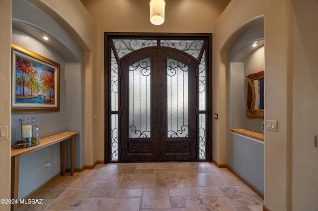 entryway featuring french doors