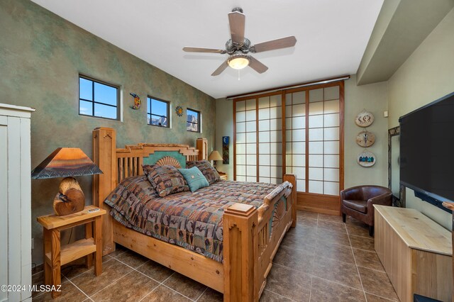 bedroom featuring ceiling fan