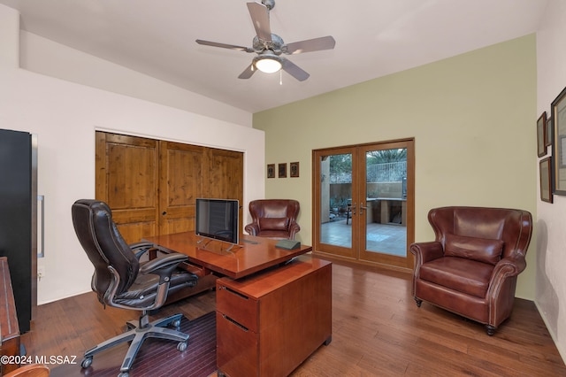 home office with dark hardwood / wood-style floors, french doors, and ceiling fan