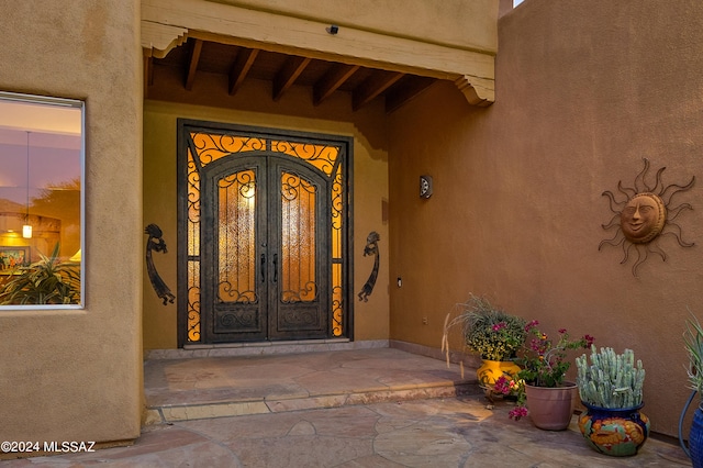 view of exterior entry with french doors