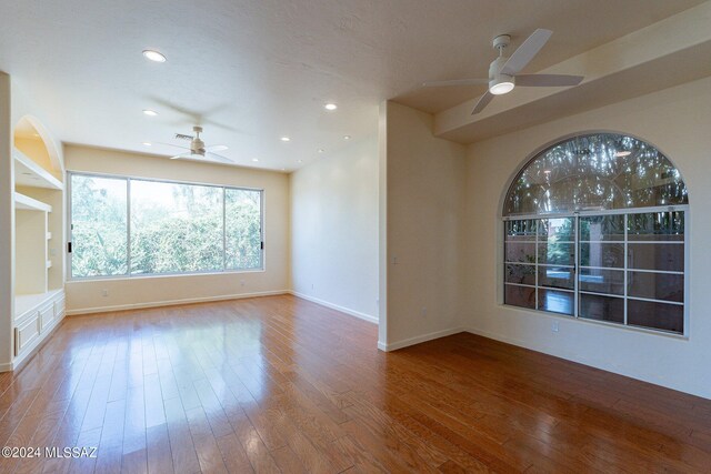 spare room featuring ceiling fan, recessed lighting, and hardwood / wood-style flooring
