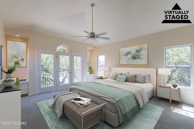 bedroom with multiple windows, access to exterior, and vaulted ceiling
