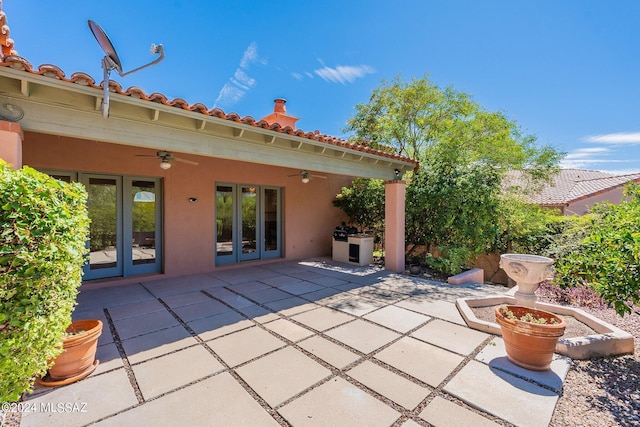 view of patio / terrace featuring french doors and a ceiling fan