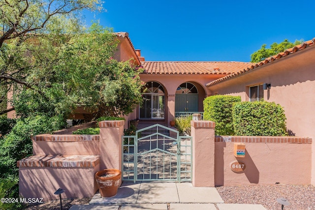 view of patio / terrace with a gate and fence