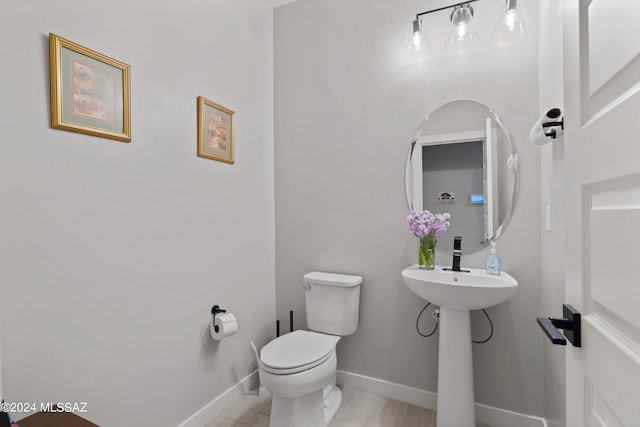 bathroom featuring toilet